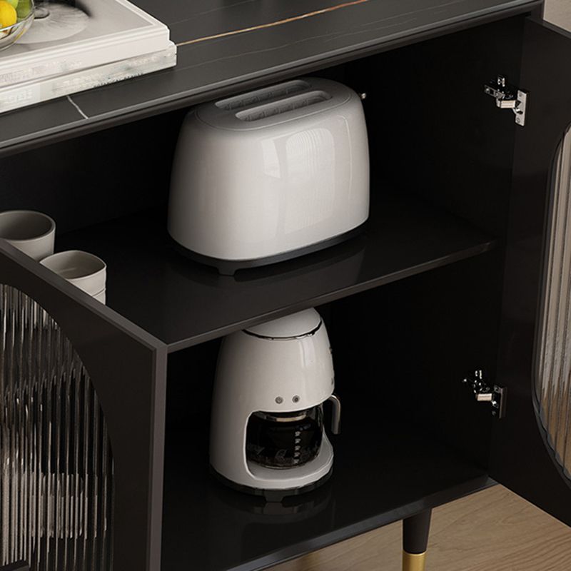 Servidor de comedor de madera de ingeniería moderno de un aparador negro con cajones y almacenamiento