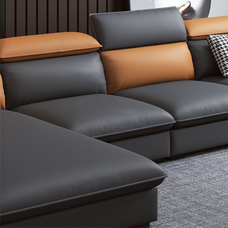 Divano contemporaneo di divano in pelle finta con cuscini di padri