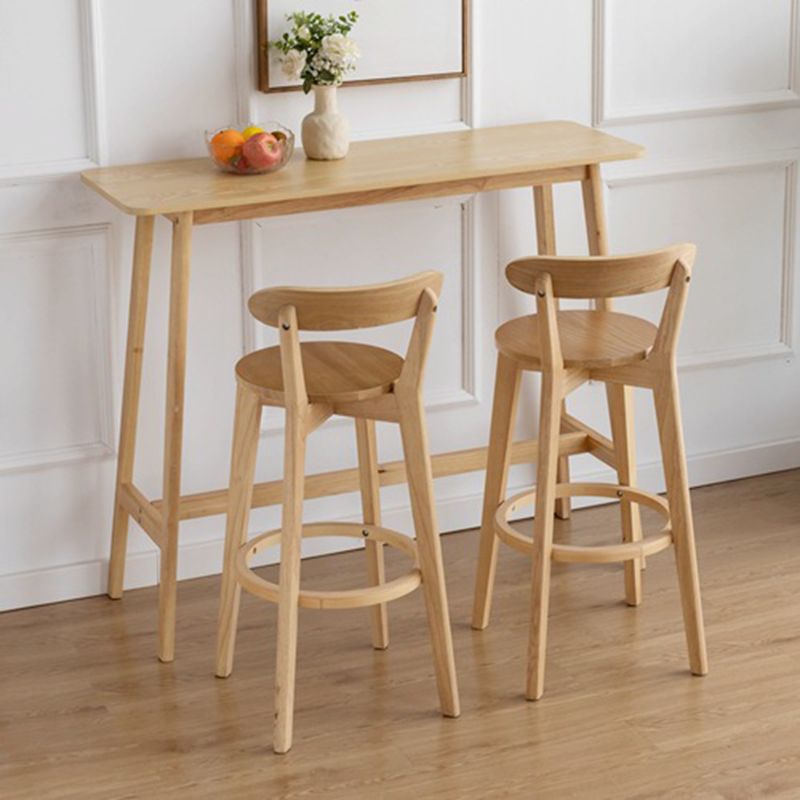 Tavolo da bar rettangolo contemporaneo banda bar a barre in legno massello con poggiapiedi