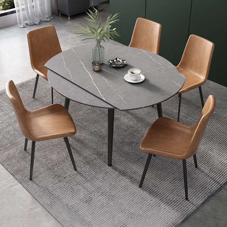 52" Round Sintered Stone Top Table Extendable 4 Legs Dining Table, Metal in Black Clearhalo ' dining_table' 'Dining Tables & Seating' 'Dining Tables' 'furn' 'furn_dining_table' 'Furniture' 'furniture_dining_table' 'Kitchen & Dining Furniture' 'kitchen&dining_furn' 'kitchen' 'kitchen_dining_table' 1200x1200_5095710a-aaa1-479d-8cc6-68efa49662ce
