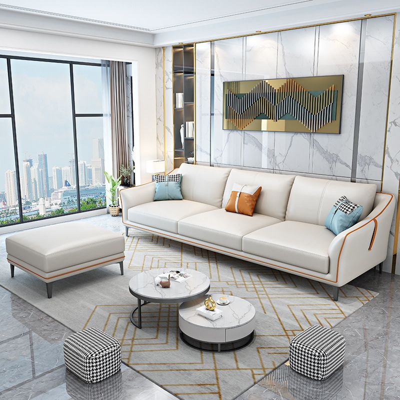 Divano braccio inclinato in pelle moderna di metà secolo con cuscini con cuscini