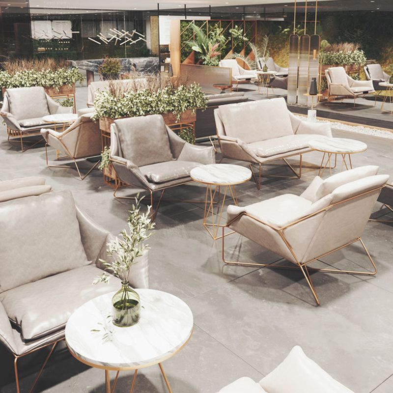 27.56 "de amplio estilo escandinavo acento sillón cruzado silla de brazo de metal cruzado