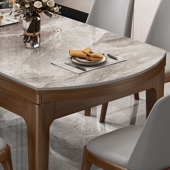 Mesa de comedor redonda moderna de piedra extensible para espacios pequeños en gris