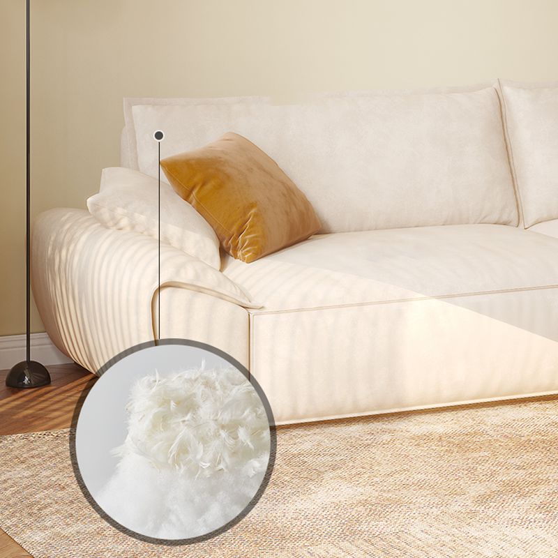 Beige Flared Arm Sofa Faux Leather Seating with Pillows for Living Room