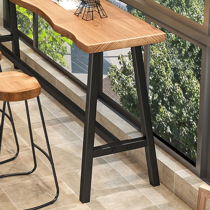 Brown Modern Style Table Solid Wood and Iron Balcony Bar Table Clearhalo 'Bar Furniture' 'Bar Tables' 'bar_tables' 'furn' 'furn_bar_tables' 'Furniture' 'furniture_bar_tables' 'Kitchen & Dining Furniture' 1200x1200_54d68e55-eb05-4027-84ae-e175decddab1