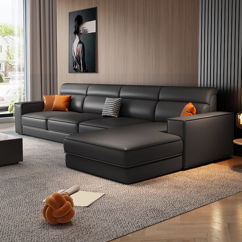 Divano in finta pelle scandinavo grigio scuro del braccio quadrato.