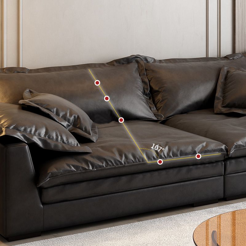 Soggiorno in vetro in pelle stazionaria in vetrino. Divano nero