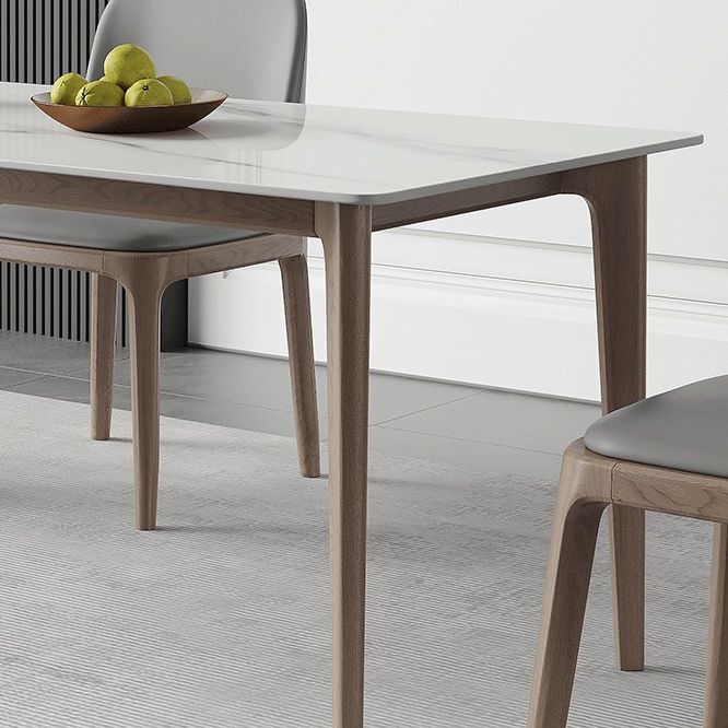 Mid-Century Rectangle Dining Table Stone Dining Table with Solid Wood Legs Clearhalo 'Dining Tables & Seating' 'Dining Tables' 'dining_table' 'furn' 'furn_dining_table' 'Furniture' 'Kitchen & Dining Furniture' 1200x1200_565c9ac8-0634-484e-86bc-61a5d2983556