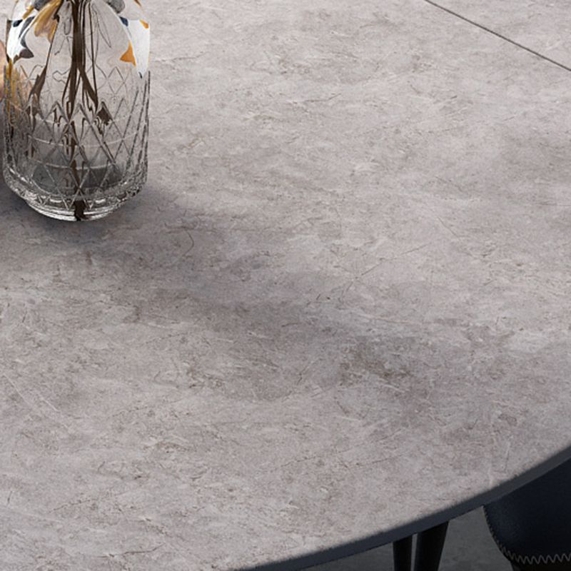 Moderne gesinterde stenen eettafel ronde tafel met metalen poten voor thuisgebruik