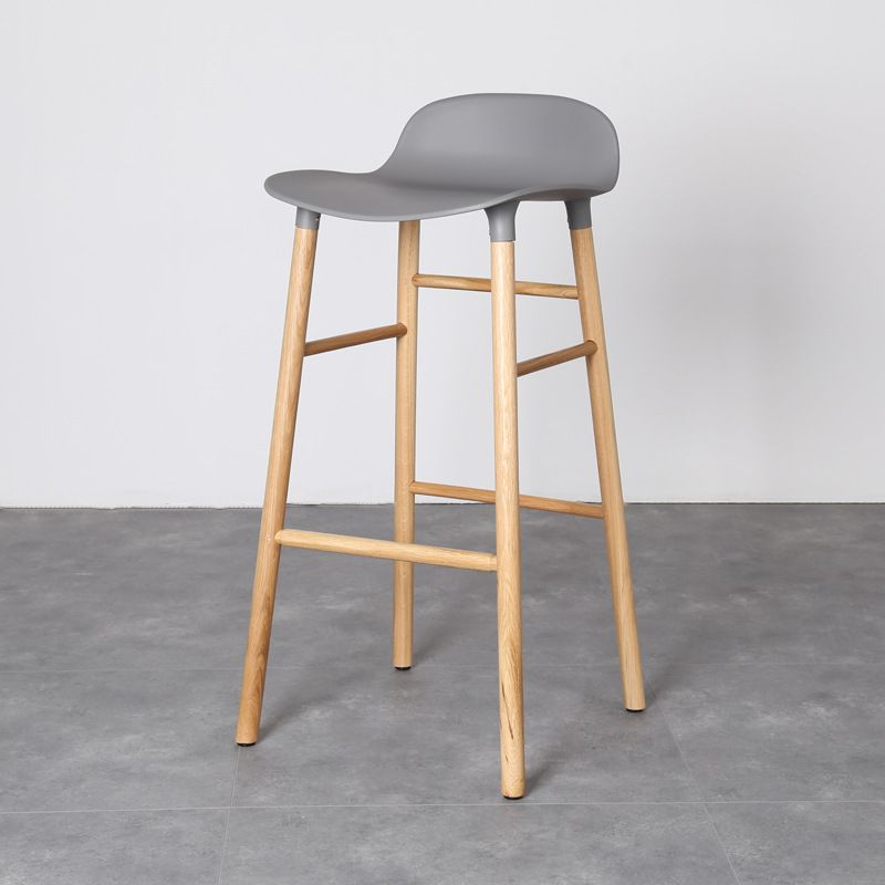 Modern Counter Bar Stool Armless Plastic Indoor Bar Stool with Footrest and Wood Base Clearhalo 'Bar Furniture' 'Bar Stools' 'bar_stools' 'furn' 'furn_bar_stools' 'furniture_bar_stools' 'Kitchen & Dining Furniture' 'kitchen&dining_furn' 'kitchen' 'kitchen_furn' Furniture' 1200x1200_57ce5cbb-225f-4062-90c3-ffbd374796db