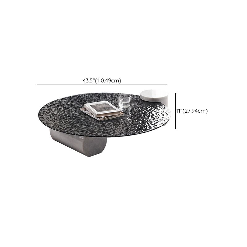 Table basse ronde avec dessus en verre Table de cocktail basse abstraite noire