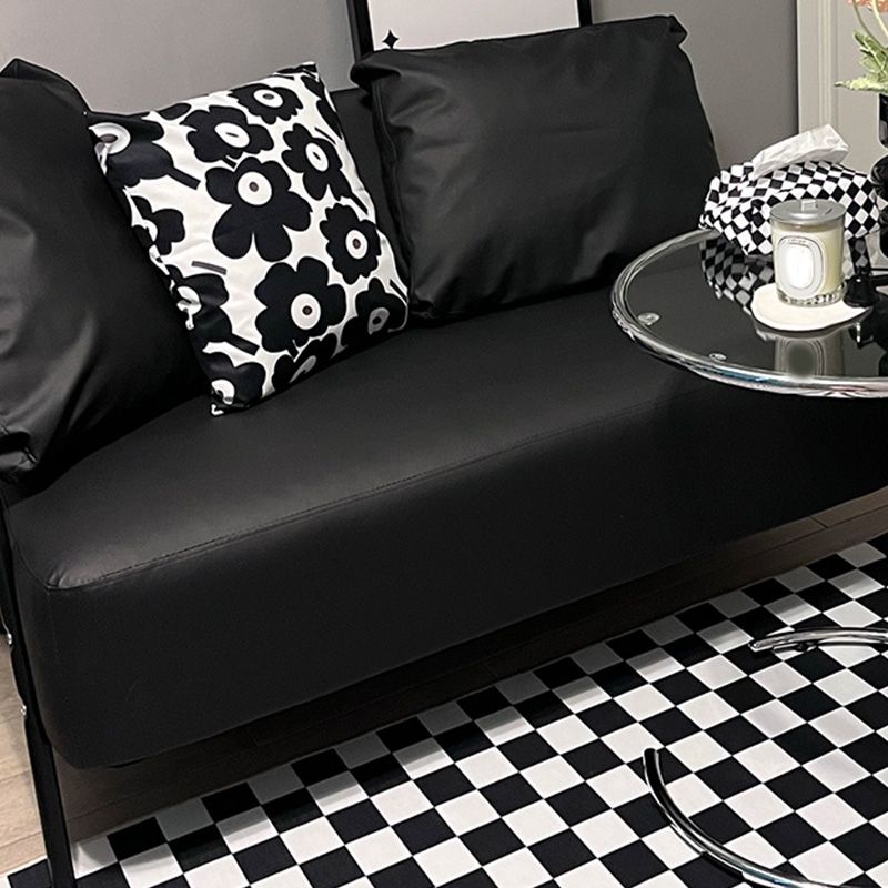 Sofá de metal con almohadas de refuerzo contemporáneas con asientos de cuatro patas