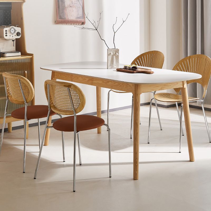 Table rectangulaire de style moderne en pierre frittée avec pieds en bois pour la maison