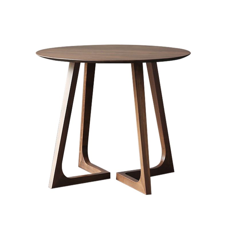 Tavolino a base di gambe incrociate in legno massiccio con cima rotonda