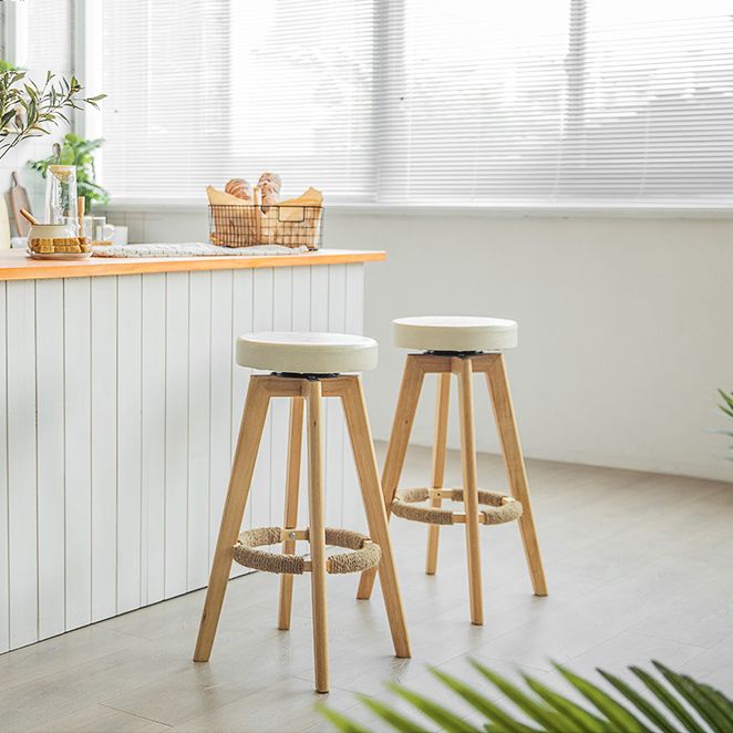 Modern Counter Bar Stool Armless Leather Bar Stool with Footrest and Swivel, Wood Base Clearhalo 'Bar Furniture' 'Bar Stools' 'bar_stools' 'furn' 'furn_bar_stools' 'furniture_bar_stools' 'Kitchen & Dining Furniture' 'kitchen&dining_furn' 'kitchen' 'kitchen_furn' Furniture' 1200x1200_5accf219-3ef9-4ab3-8323-3cf9d4a9c29c