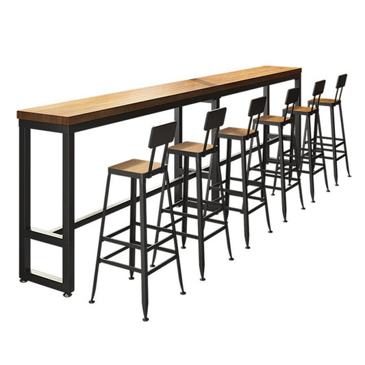 モダンなスタイルの長方形のバーテーブルソリッドウッドバーダイニングテーブルフットレスト