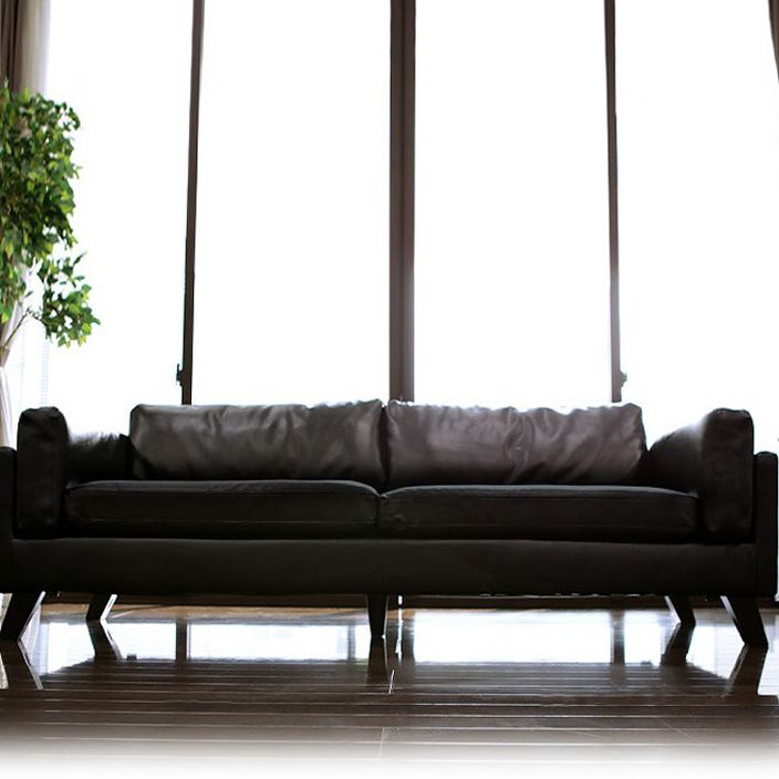 Canapé en cuir faux en cuir carré avec coussins pour le salon