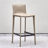 Tabourets en faux cuir beige avec repose-pieds tabourets de bar intérieur contemporains