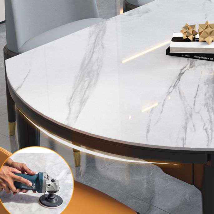 Luxe ronde grijze stenen topverlenging eettafel met 4 zwarte en gouden poten