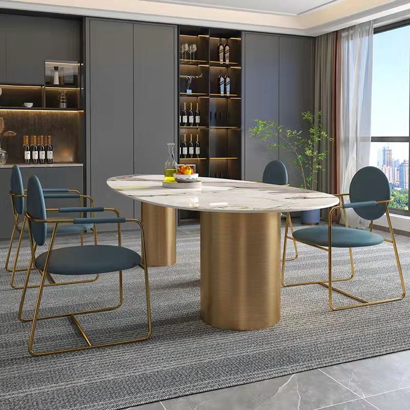 Mesa de comedor de piedra sinterizada de lujo con 3 patas en oro