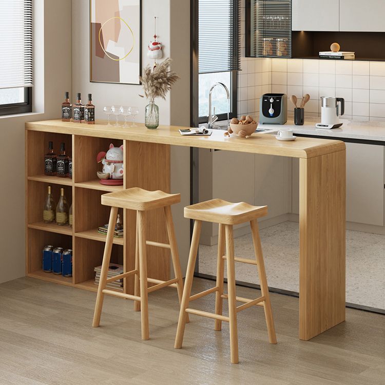 Solid Wood Bar Dining Table Pedestal Rectangle Bistro Bar Table in Natural with Shelves Clearhalo 'Bar Furniture' 'Bar Tables' 'bar_tables' 'furn' 'furn_bar_tables' 'Furniture' 'Kitchen & Dining Furniture' 1200x1200_5d9c31ad-56ff-4ed5-871a-f01094e5a5f7