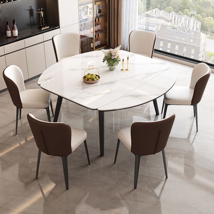 Tavolo da pranzo moderno allungabile in pietra con base in legno per sala da pranzo
