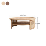 Tavolino rotondo scandinavo con scaffale in vimini e legno massiccio