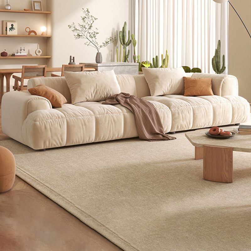 Sofá de estilo moderno coján de reposapiés embebido