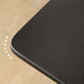 Table de salle à manger rectangulaire moderne avec plateau en pierre noire et 4 pieds en bois massif