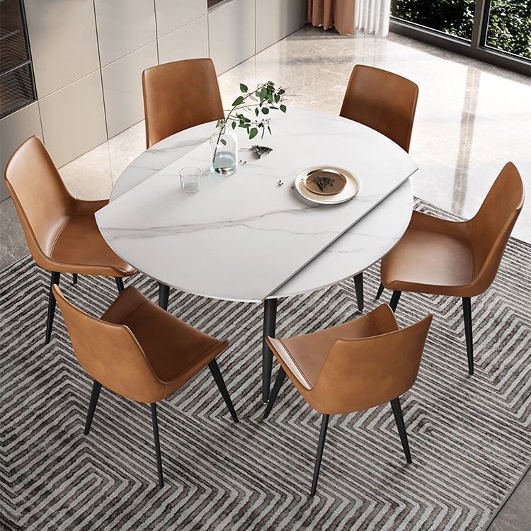 53.15''L Round Contemporary Dining Table Sintered Stone Table with 4 Black Metal Legs Clearhalo ' dining_table' 'Dining Tables & Seating' 'Dining Tables' 'furn' 'furn_dining_table' 'Furniture' 'furniture_dining_table' 'Kitchen & Dining Furniture' 'kitchen&dining_furn' 'kitchen' 'kitchen_dining_table' 1200x1200_6093fce2-dc98-4ed5-b272-de636dd38412