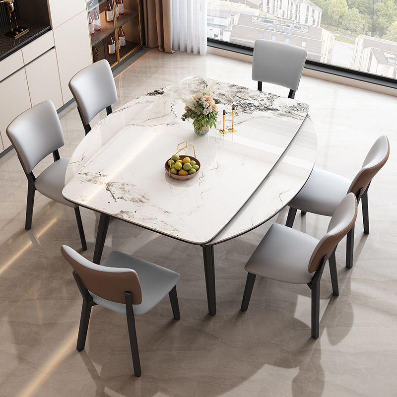 Tavolo da pranzo moderno allungabile in pietra con base in legno per sala da pranzo