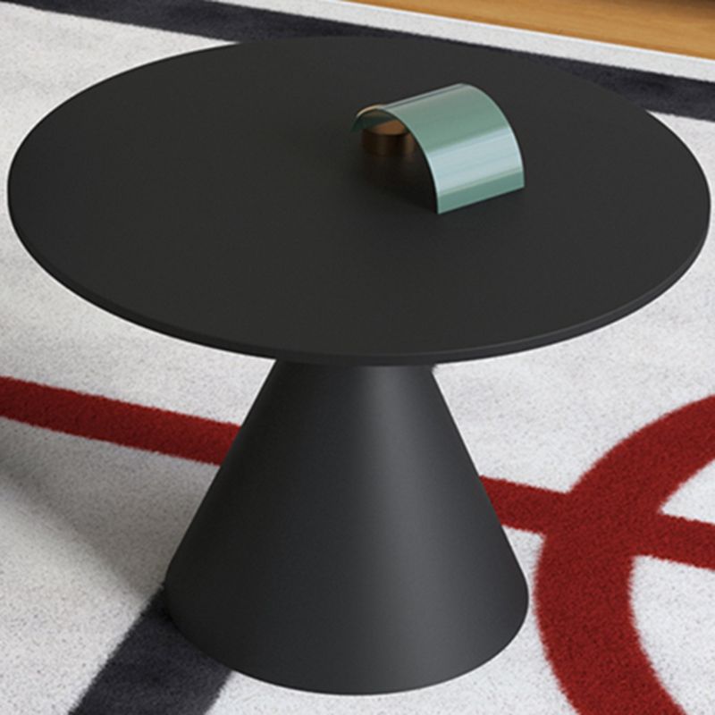 Moderne zwart/witte salontafel met ronde bovenkant, ijzeren voetstuk, cocktailtafel uit het midden van de eeuw