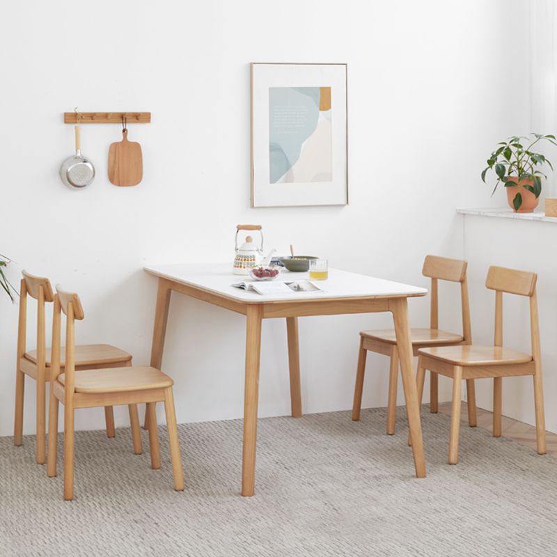 Mesa de comedor rectangular de piedra moderna con patas de madera para comedor