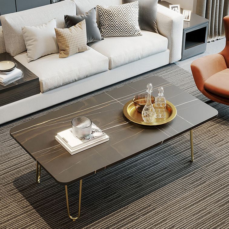 Tavolino da cocktail in pietra rettangolare glam con 4 gambe metalliche tavolino