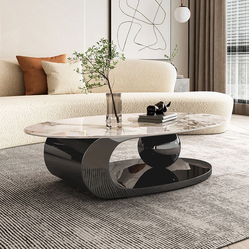 Elliptical Stone Glam Abstrakter Kaffee-Cocktailtisch mit Bodenregal