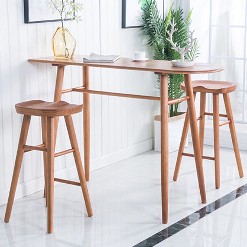 Industrial Armless Bar Stools Solid Wood Dining Stool with Footrest Clearhalo 'Bar Furniture' 'Bar Stools' 'bar_stools' 'furn' 'furn_bar_stools' 'Furniture' 'Kitchen & Dining Furniture' 1200x1200_624a74dd-dd99-4a99-932e-484283370437