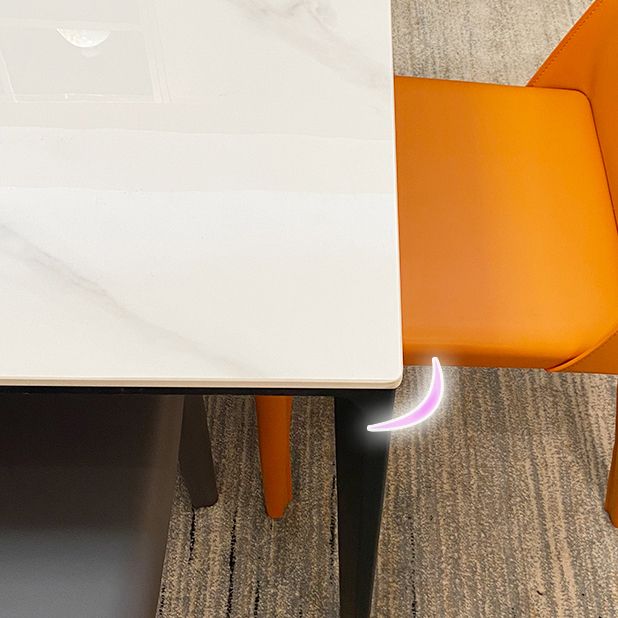 Tavolo da pranzo rettangolare moderno in pietra bianca con 4 gambe in metallo nero