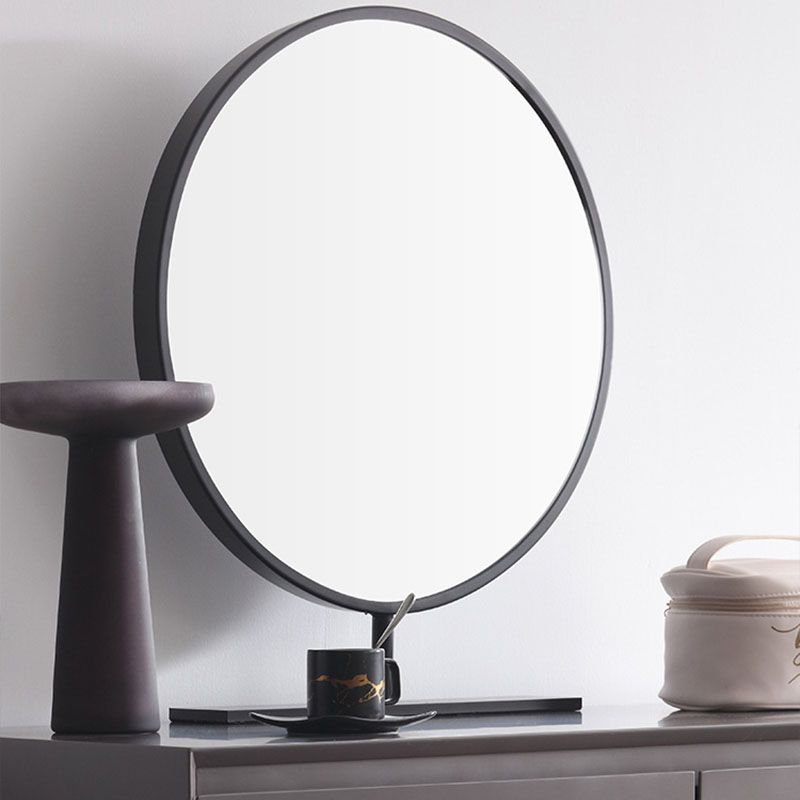 鏡と引き出しを備えた灰色の木製の虚栄心の虚栄心