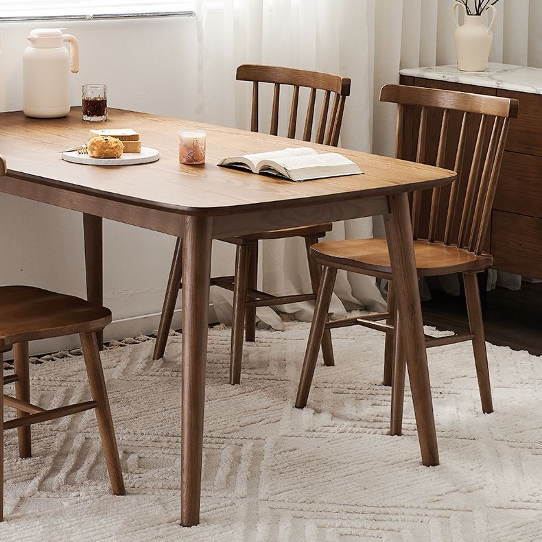 Modern Rectangular Space Saving Brown Walnut Dining Table with 4 Legs Clearhalo 'Dining Tables & Seating' 'Dining Tables' 'dining_table' 'furn' 'furn_dining_table' 'Furniture' 'Kitchen & Dining Furniture' 1200x1200_64315908-e196-4928-844f-091c207cd303