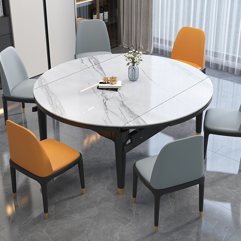 Luxe ronde grijze stenen topverlenging eettafel met 4 zwarte en gouden poten