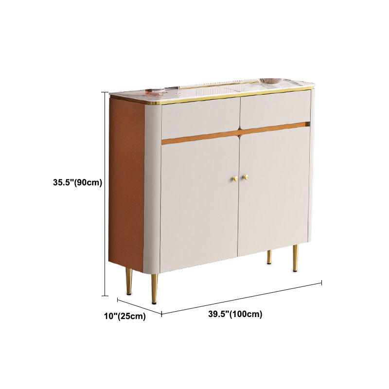 Sideboard di pietra in pietra glam bianca con porta per la cucina