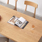 Mesa de comedor rectangular de madera maciza de color natural con base de caballete