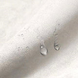 Divano con divano trapuntato glam in tessuto in tessuto convertibile in bianco in bianco