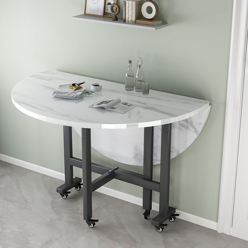 Modern White Round Wooden Easy Folding Dining Table with Leaf Clearhalo 'Dining Tables & Seating' 'Dining Tables' 'dining_table' 'furn' 'furn_dining_table' 'Furniture' 'Kitchen & Dining Furniture' 1200x1200_6735c3cb-2a14-4edb-9fd5-886f2b3e1892