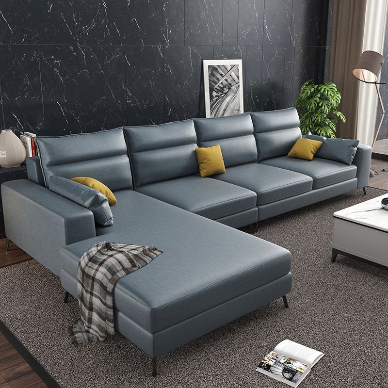 Fuce in pelle a forma di L sezionale con cuscino indietro per quattro persone