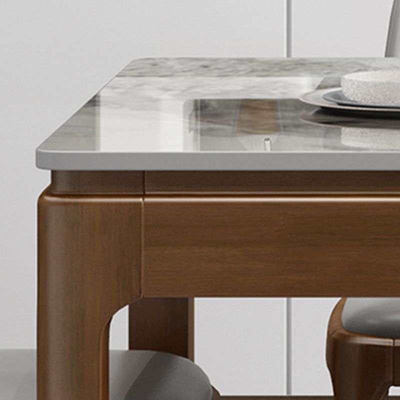 Mesa de comedor de piedra gris rectangular moderna con 4 patas de madera de goma