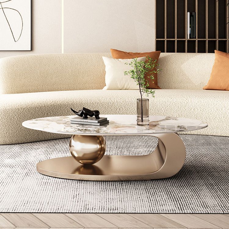 Mesa de centro elíptica de pizarra Glam de 27,6" D Mesa de cóctel abstracta con estante de piso