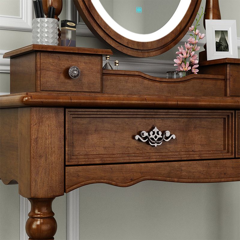 Vanity di trucco in legno in solido marrone con cassetti e tavolo da toeletta a specchio