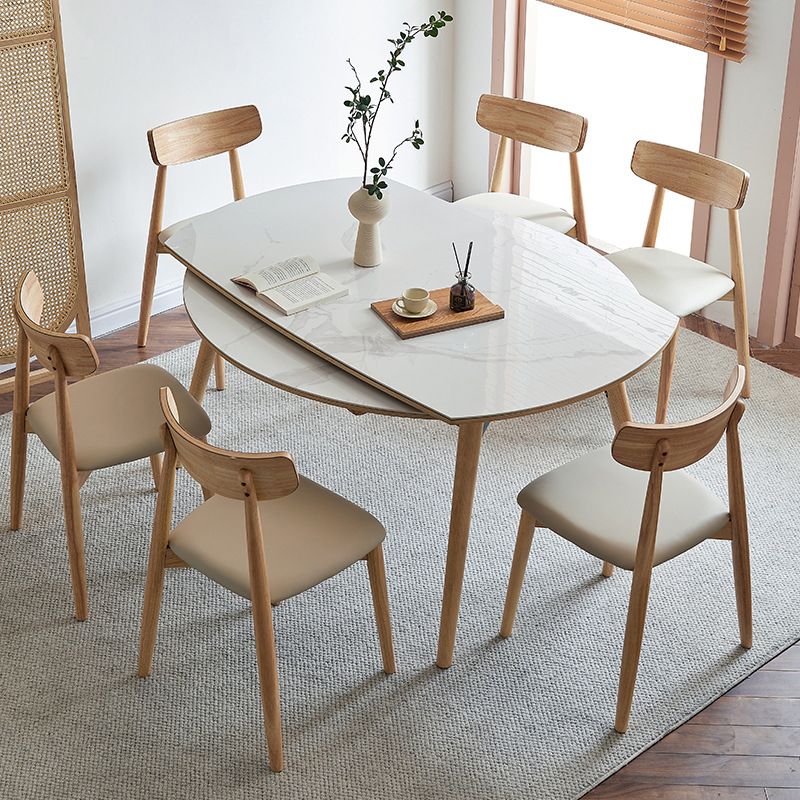 Table à manger en pierre ronde et fritrée meubles extensibles modernes avec 4 jambes pour la maison