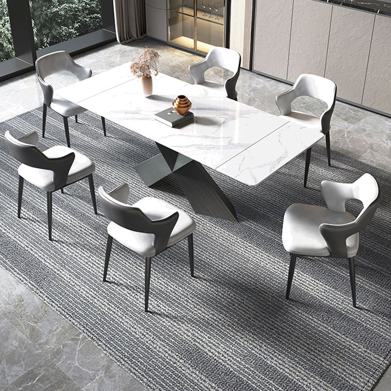 Mesa de comedor de piedra blanca rectangular moderna con pedestal doble de acero negro